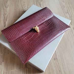 Alexander McQueen crocodile clutch